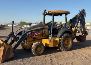 Back hoe 310 for sale