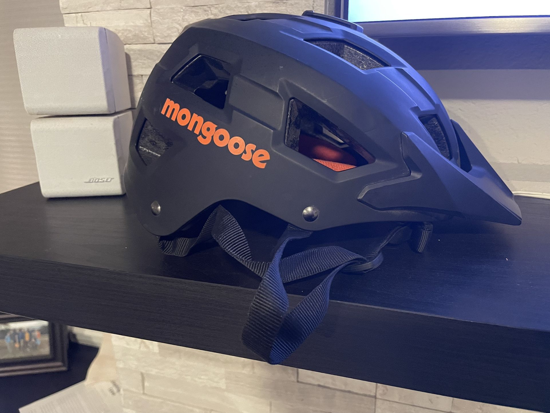 Like new medium Mongoose black mountain biking helmet (adjustable sizing)