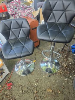 Price is firm two beautiful height adjustable bar stools