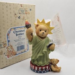 New 1997 Cherished Teddies LIBBY statue Of Liberty Bear Figurine Country NIB

MINT CONDITION,  STORED IN THE BOX, COMES WITH ORIGINAL PACKAGING

LIBBY