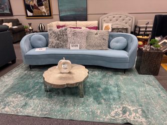 Luxury Light Blue Velvet Curved Sofa with Black Legs