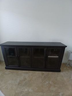 Dark Wood Sideboard with Glass Doors