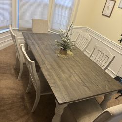 Raymour and Flanigan rustic gray dining room table