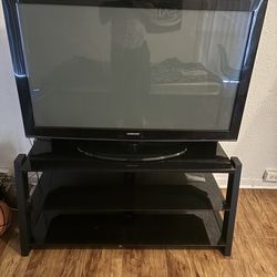 46 inch Samsung TV and TV stand with Glass