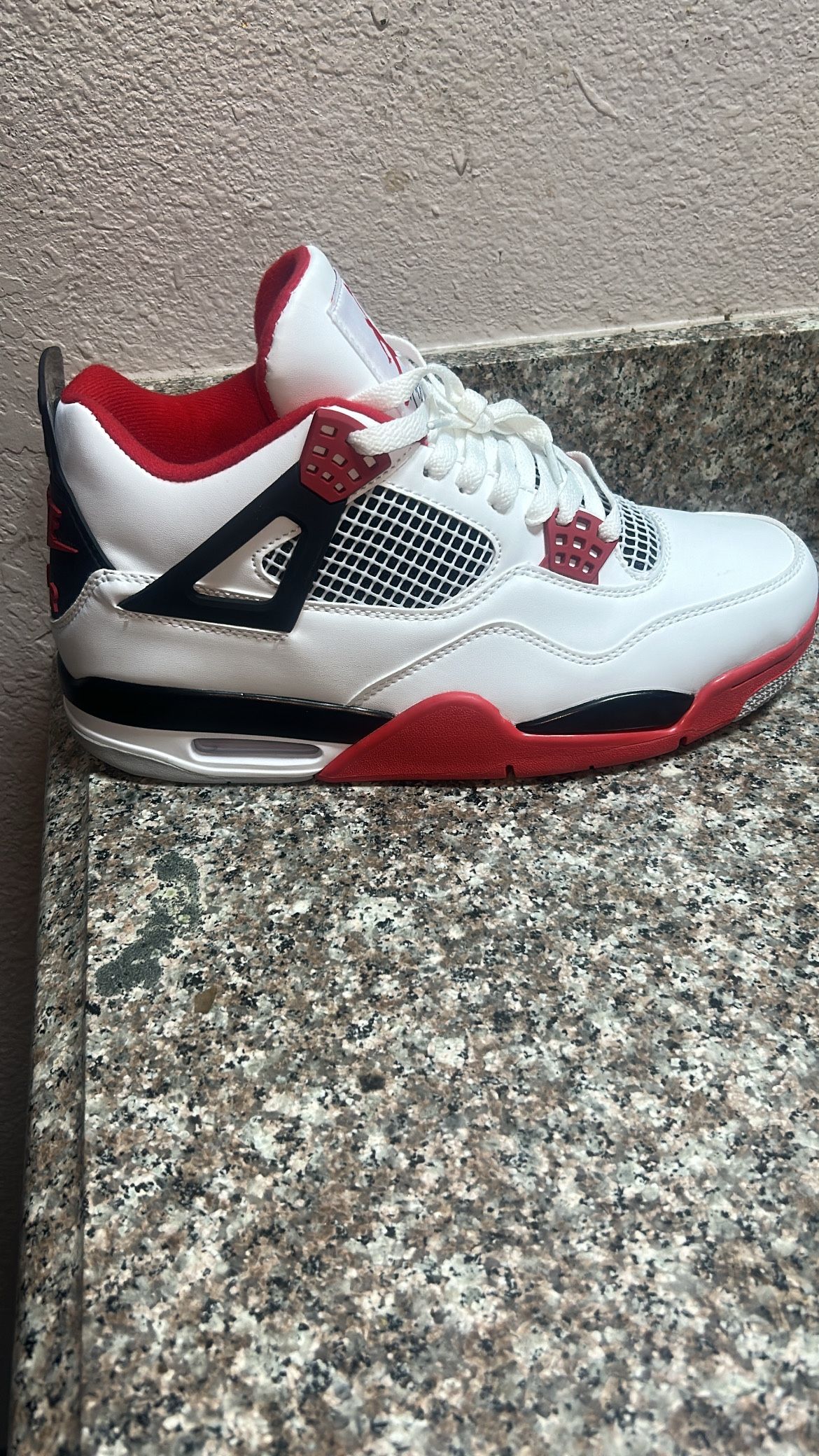 Fire Red Jordan 4