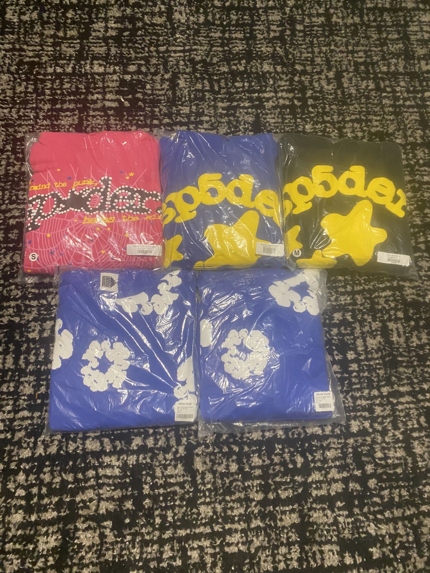 Spider and denim hoodies