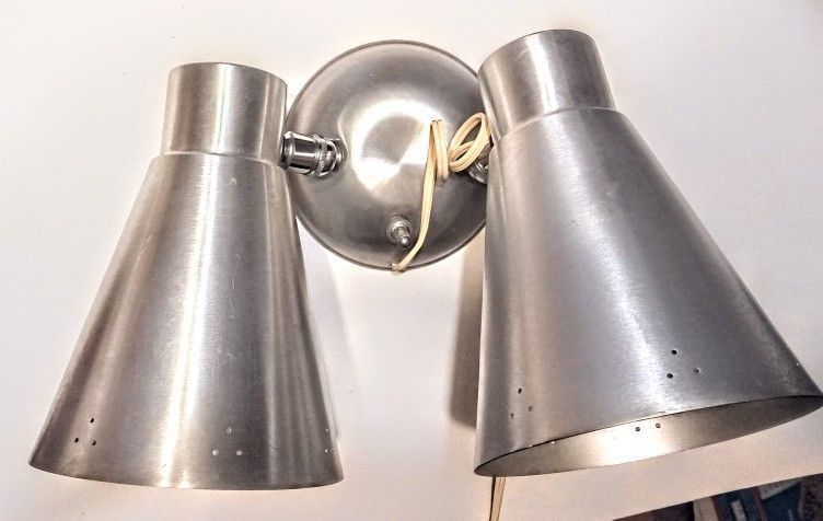Authentic midcentury modern spun aluminum wall sconce reading lamps.