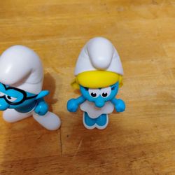 Smurfette And Inert Smurf And Two Power Rangers