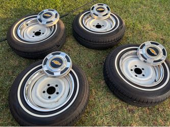 1972 through 1985 Chevy pick up rims and tires and caps