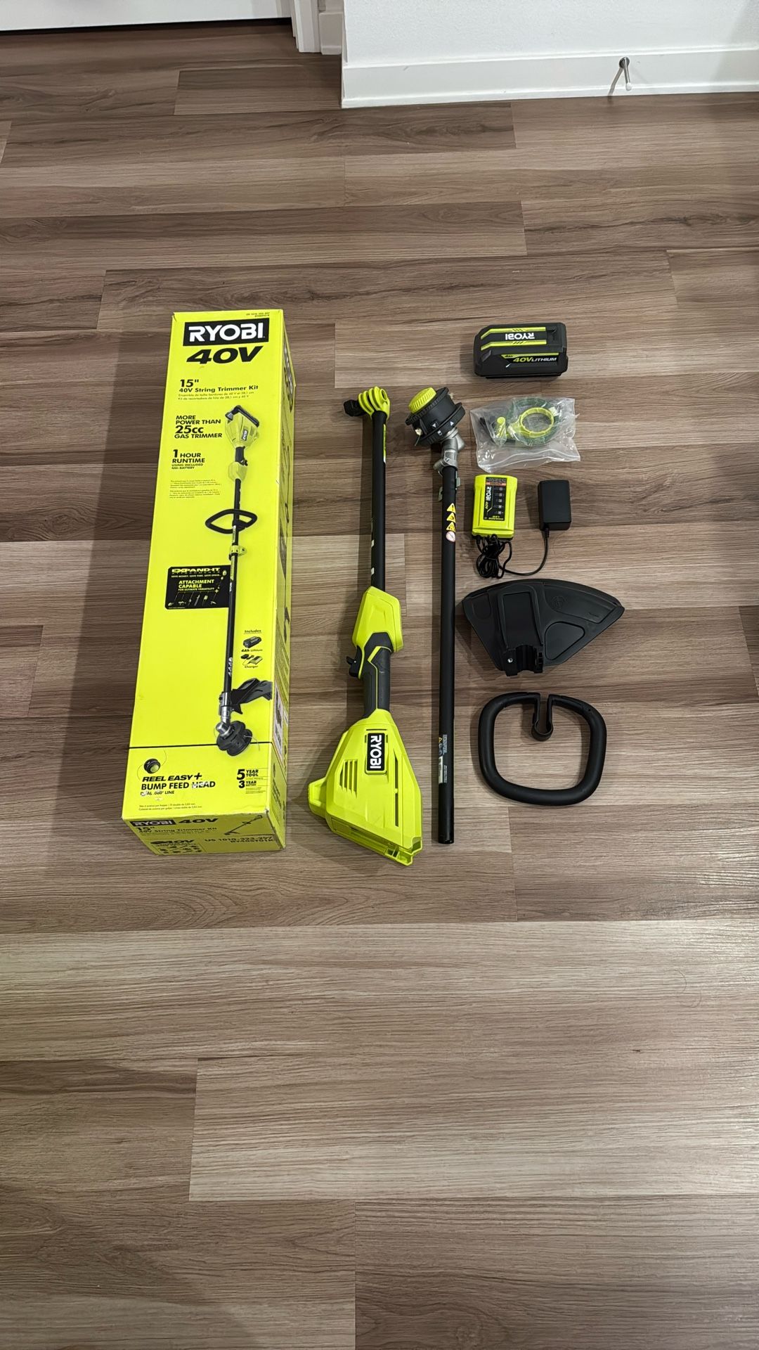 RYOBI 40V 15 in. Expand-It Cordless Battery Attachment Capable String Trimmer with 4.0 Ah Battery an