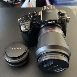 Panasonic GH3 DSLR 14-140 And 20mm Lenses