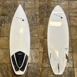epoxy surfboard with fins