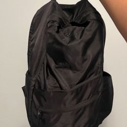 Gaiam Backpack with a lot of zippers and padded on the back. 
