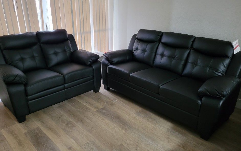 Sleek Black Sofa And Loveseat
