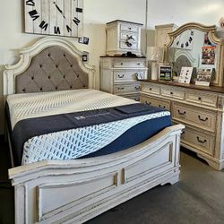 Realyn Chipped White Upholstered Panel Bedroom Set