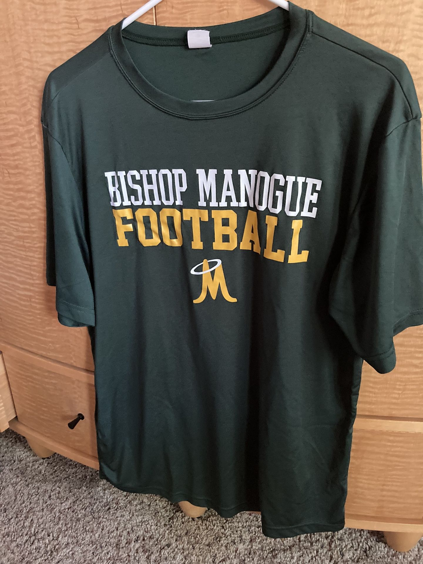 Manogue High Football T shirt. Medium
