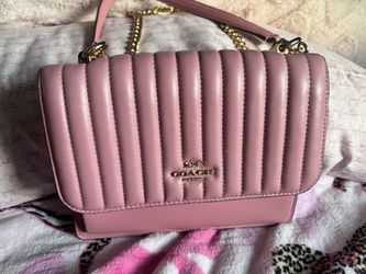 Pink coach quilted leather