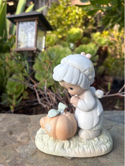Precious Moments October Birthday figurine