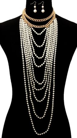 Long multi strand black or white pearls! Amazing statement pieces! Dun for dress up or dress down! Get yours today! Iamlester.com