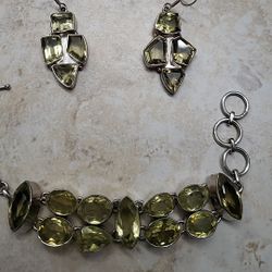 Silver and topaz earrings and bracelet