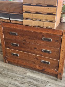 three-drawer wooden dresser