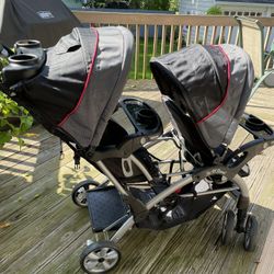 Brand New Twin Stroller With Stand Up Bar