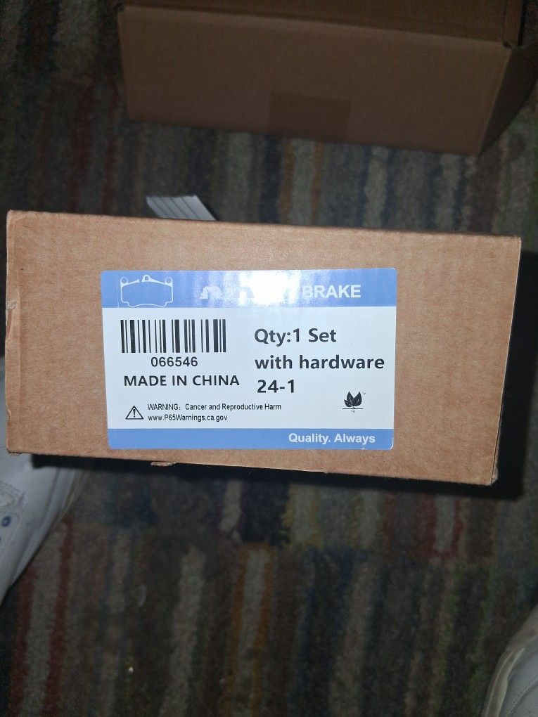 Set Of Brake Pads An Open Box All The Parts Are There
