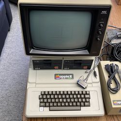 Apple II plus with floppy drives printer and monitor. Software an manuals included