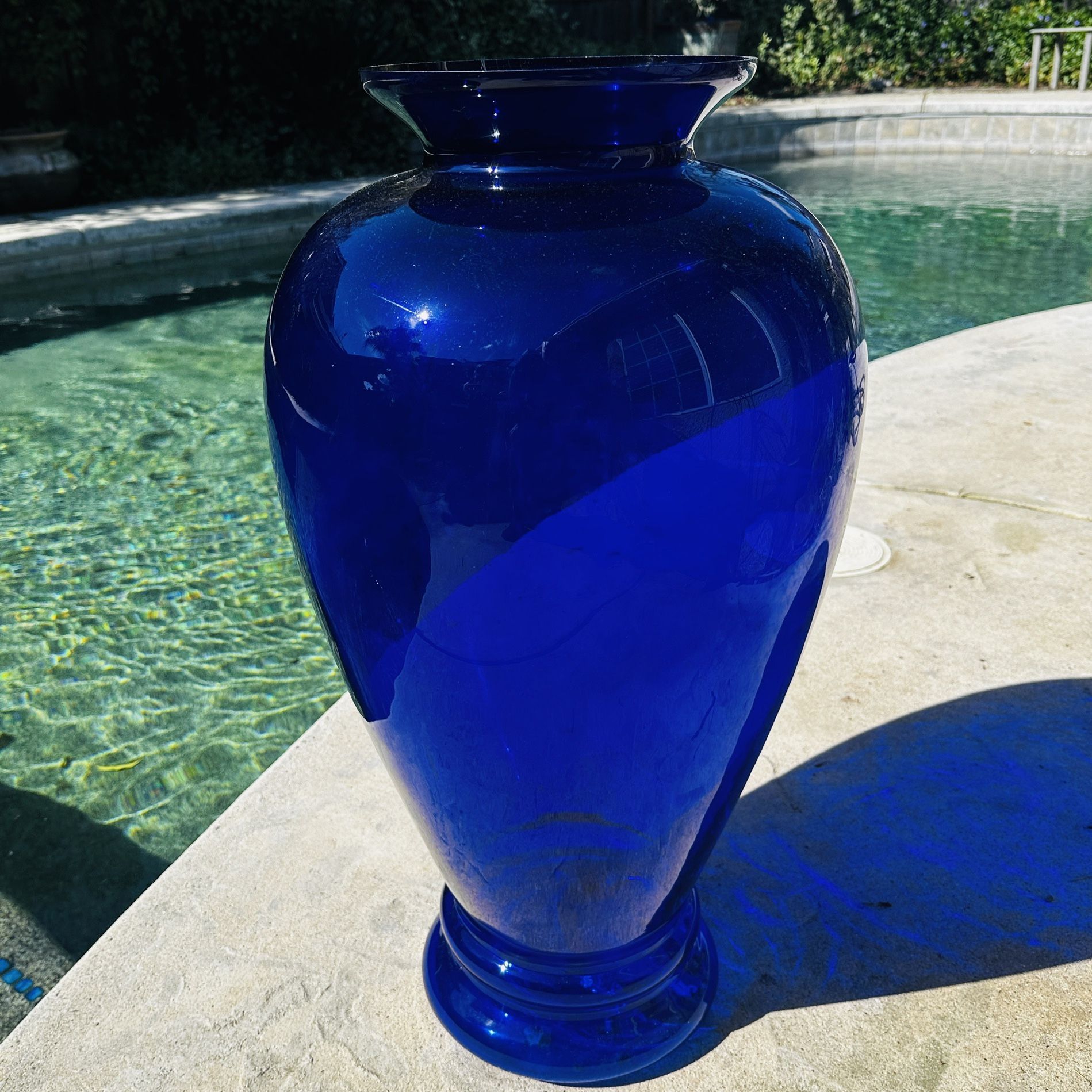 This is a Pilgrim Glass "The Masterwork Collection" cobalt blue glass vase.