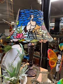 Leaded glass lamp with cranes and water lilies