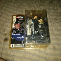 New In Package RYAN NEWMAN FIGURINE AND DISPLAY STAND