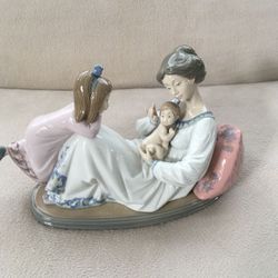 Lladro “Latest Addition” Figurine