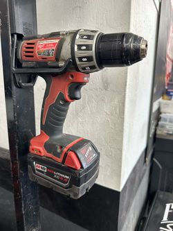 Milwaukee drill and charger