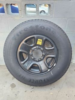 Firestone Transforce HT LT275/70R18 Tire with Wheel
