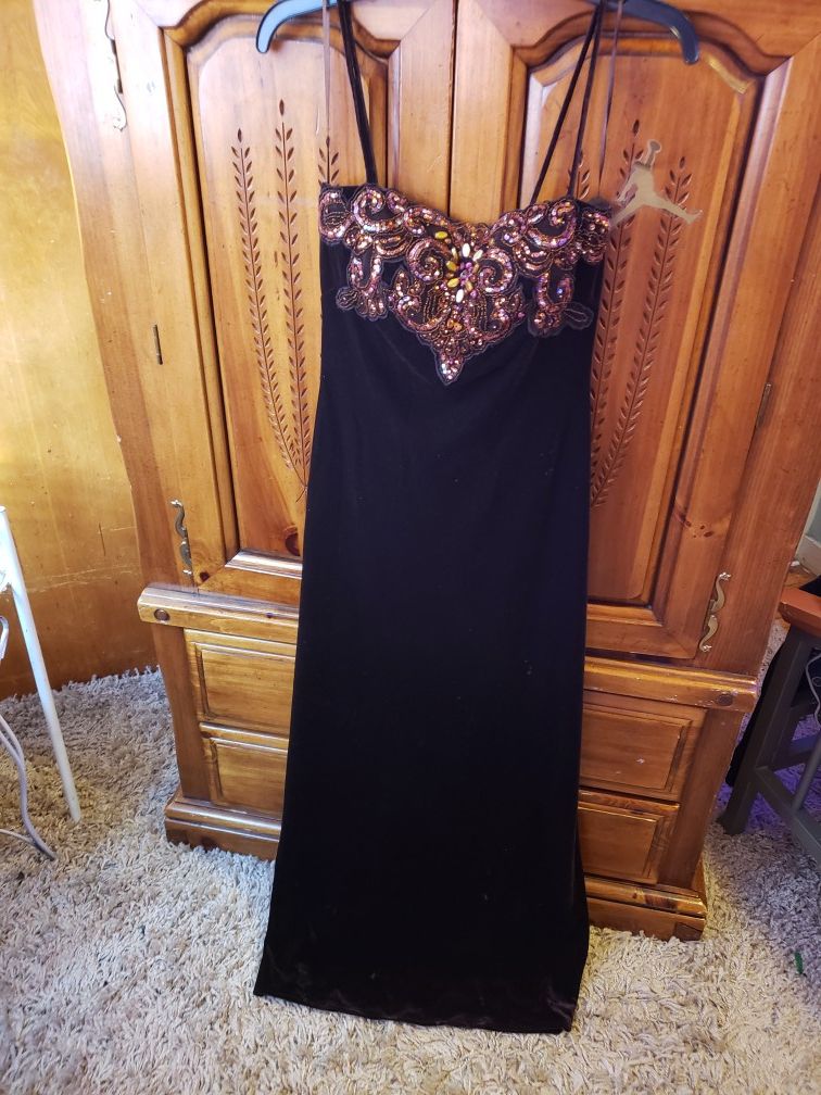 In great used condition sexy dress size on pic