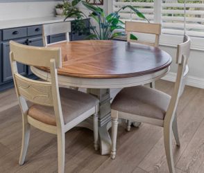 54” Round Table with 18” Leaf and 4 Chairs