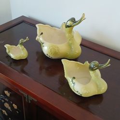 Vintage Hull Pottery Swan Planters, likely from the 1950s or 1960s