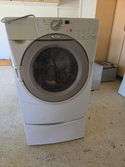 Washer and dryer also a tall fridge