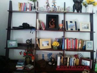 Heavy duty brown shelves in ladder.