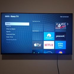 42" Roku Tv  w/ Wall Mount. 