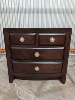 Rich Brown Wood Nightstand with Curved Drawer Fronts