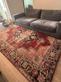 8’x10’ Red Rug With Design