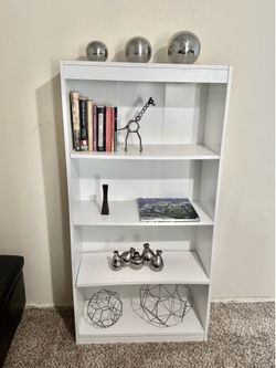 4-Tier Book shelf with adjustable shelves.