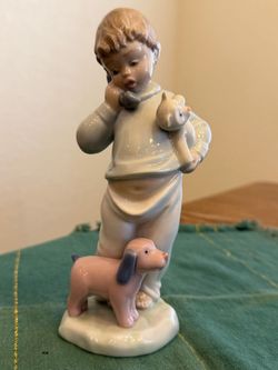 NAO by LLADRO - Nino al Telefono