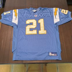 Football Jerseys, Signs, and Baseball Cap