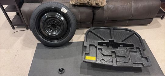 2012 Camry spare tire and foam floor piece and screw. Never used