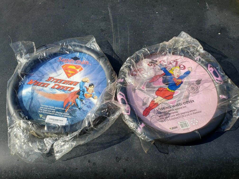 $15 Ea-- New but Dusty Steering Wheel Covers Superman And Supergirl