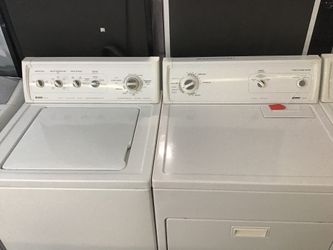 Kenmore heavy duty washer and dryer set. 1 year warranty