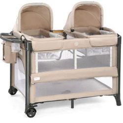 NEW - JOYMOR Twin Bassinet for Baby with Storage, Playyard with Two Bassinet, Side Sleeper for Infant