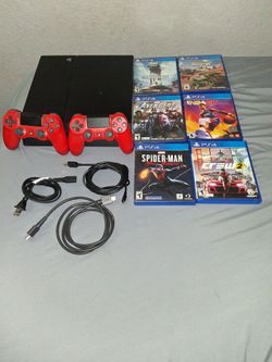 Ps4 bundle with 6 games 3 cords and a ps4
